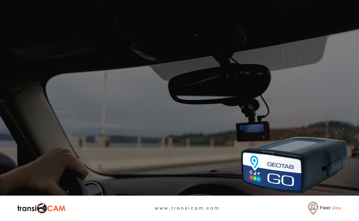 Fleet manager reviewing Geotab vehicle tracking data alongside commercial vehicle camera footage in Australia.